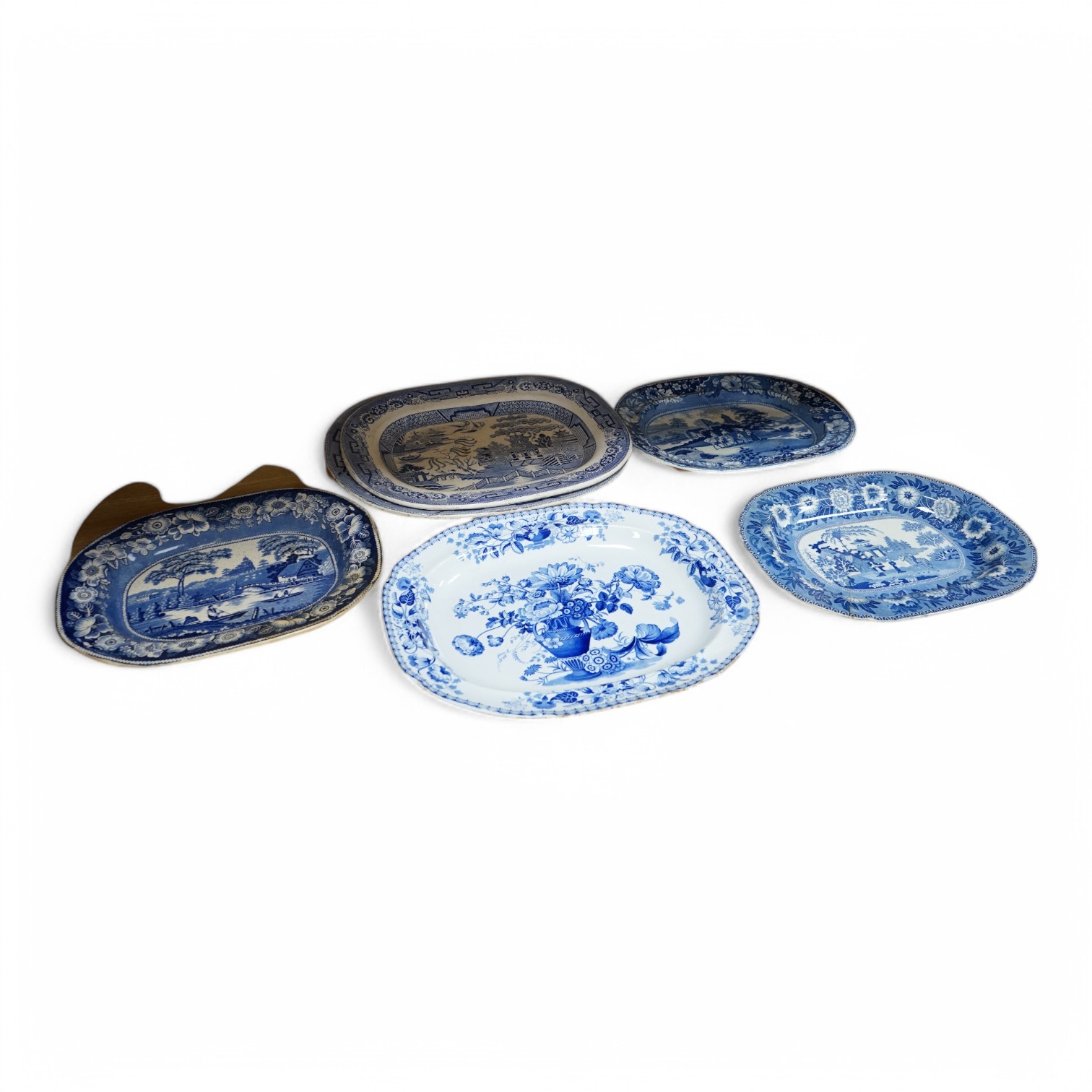 Six 19th century blue and white stoneware meat dishes to include Roger’s Staffordshire zebra pattern, largest 50cm wide. Condition - varies